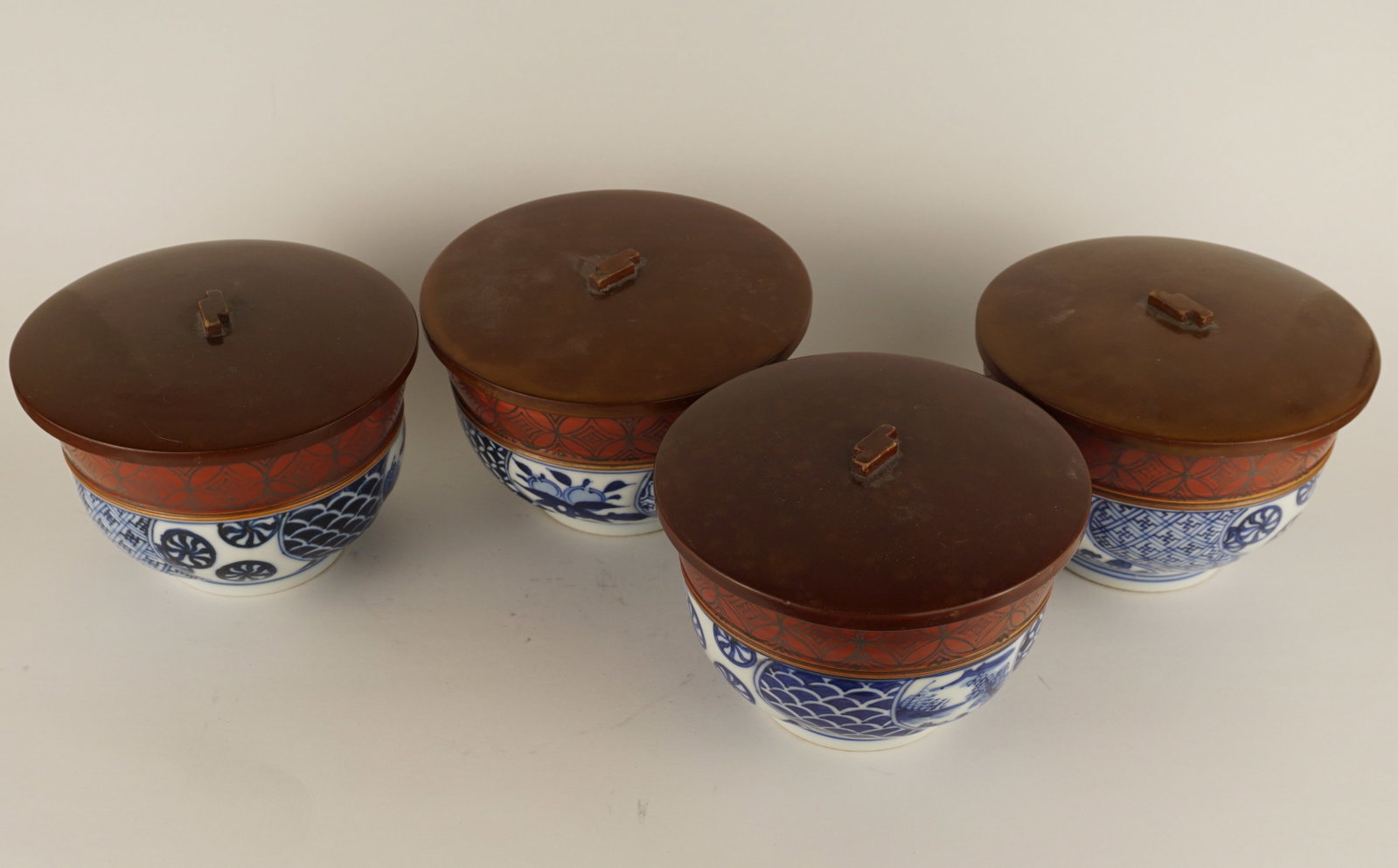 Set of 4 Japanese Shonzui Style Blue & White Porcelain Bowls, Lacquered Lids: 5.5” wide bowls. SHIPPING NOTE: We have in house shipping and can do fairly cheap rates, and I am more than happy to combine shipping. I can often do better than the Live Auctioneers shipping qu