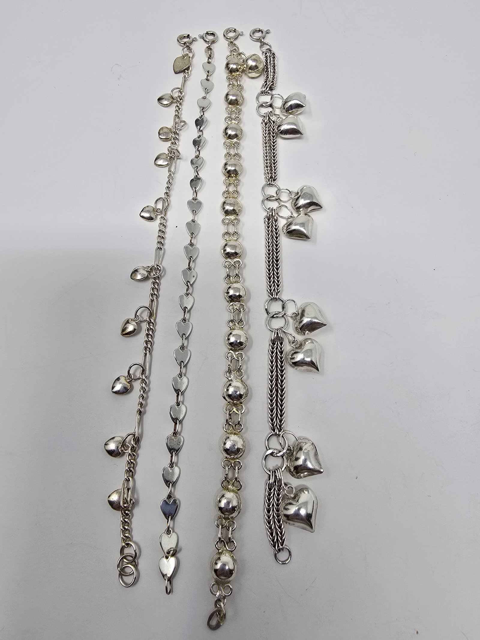 4 - 925 Sterling Silver Bracelets: 4 - 925 Sterling Silver Bracelets Hearts and Dome Styles Approx. 7"-7.25" Lengths 25.65g