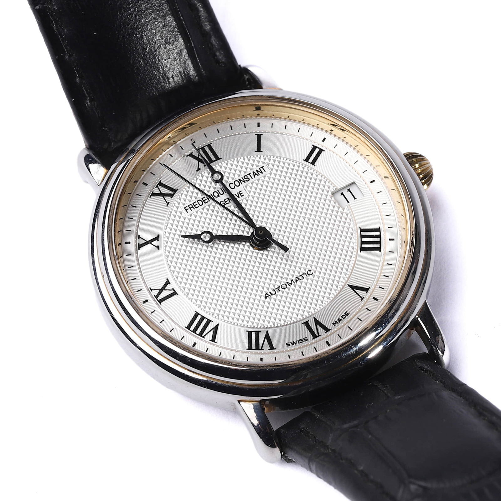 FREDERIQUE CONSTANT CLASSIC AUTOMATIC WRISTWATCH: Dimensions: Dial diameter: 1 7/16 in. (37 mm); Total length: 9 7/16 in. (24 cm) This Frederique Constant wristwatch showcases timeless Swiss elegance with its round silver-tone case, automatic