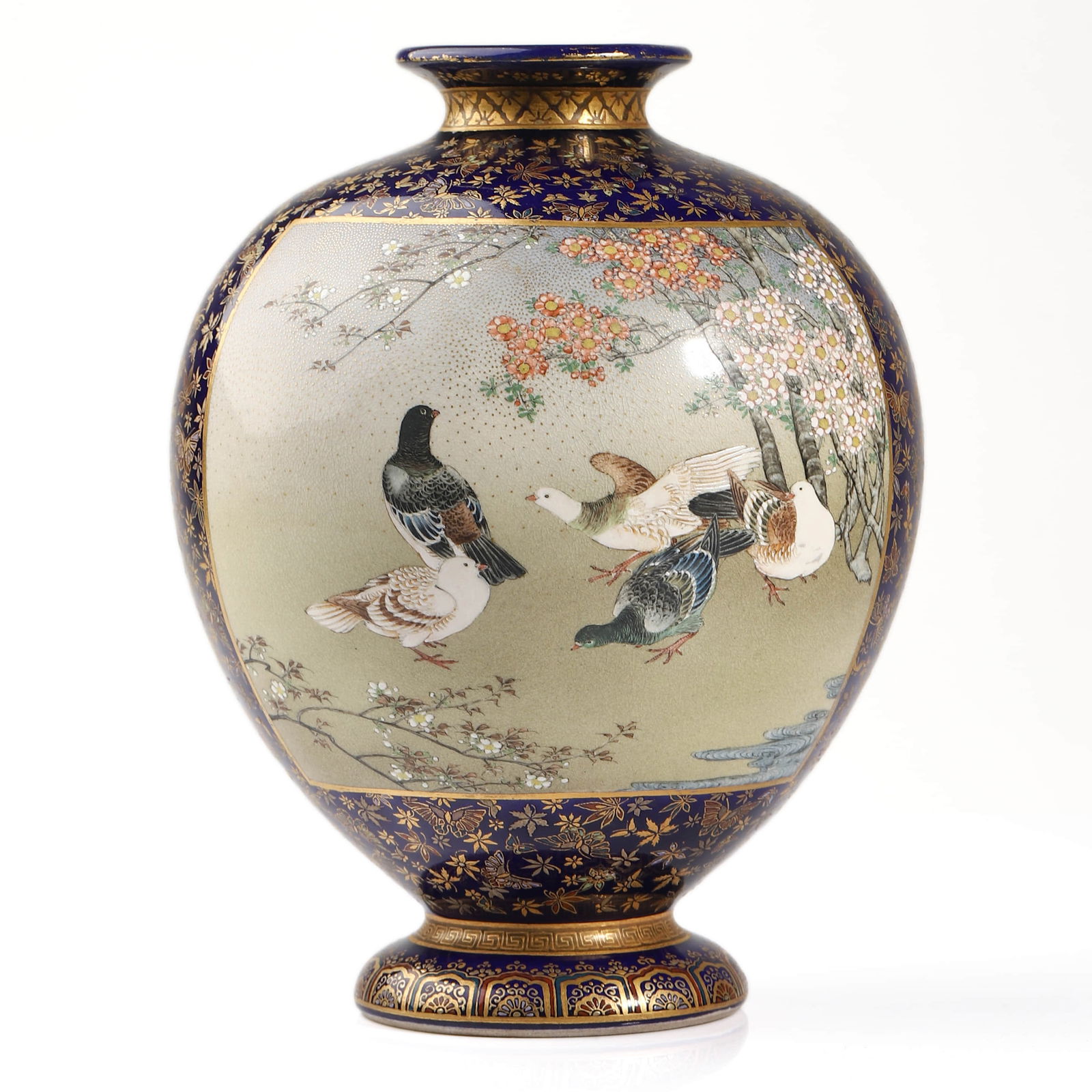 A JAPANESE SATSUMA VASE, SIGNED KINKOZAN: Dimensions: Height: 7 1/2 in. (19 cm) Description: A finely painted Japanese Satsuma vase of baluster form, decorated in delicate polychrome enamels and gilt with two continuous panels depicting