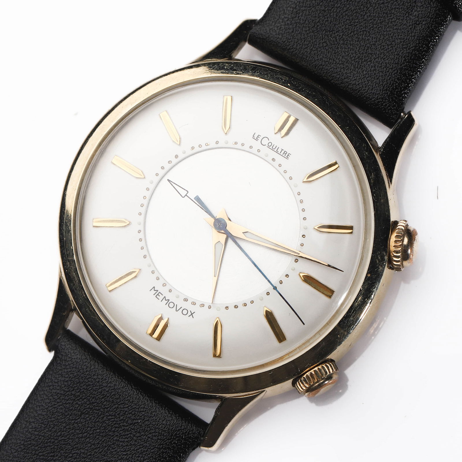 AEGER-LECOULTRE. A GOLD-FILLED MEMOVOX ALARM WRISTWATCH: Dimensions Case diameter: approx. 1 1/2 in. (38.1 mm); overall length: approx. 9 7/8 in. (25 cm). Description A classic mid-20th-century wristwatch by Jaeger-LeCoultre, featuring the iconic Memovox al