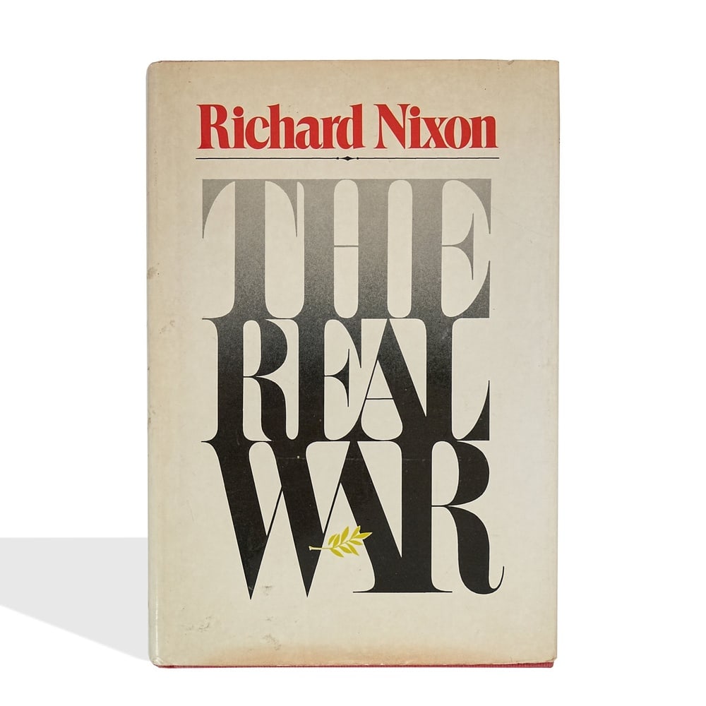 RICHARD NIXON SIGNED THE REAL WAR FIRST EDITION: 9 1/4 x 6 1/4 in (23.5 x 16 cm) Provenance and Authentication: This collectible has undergone a rigorous forensic evaluation. The signatures were carefully analyzed across multiple criteria,