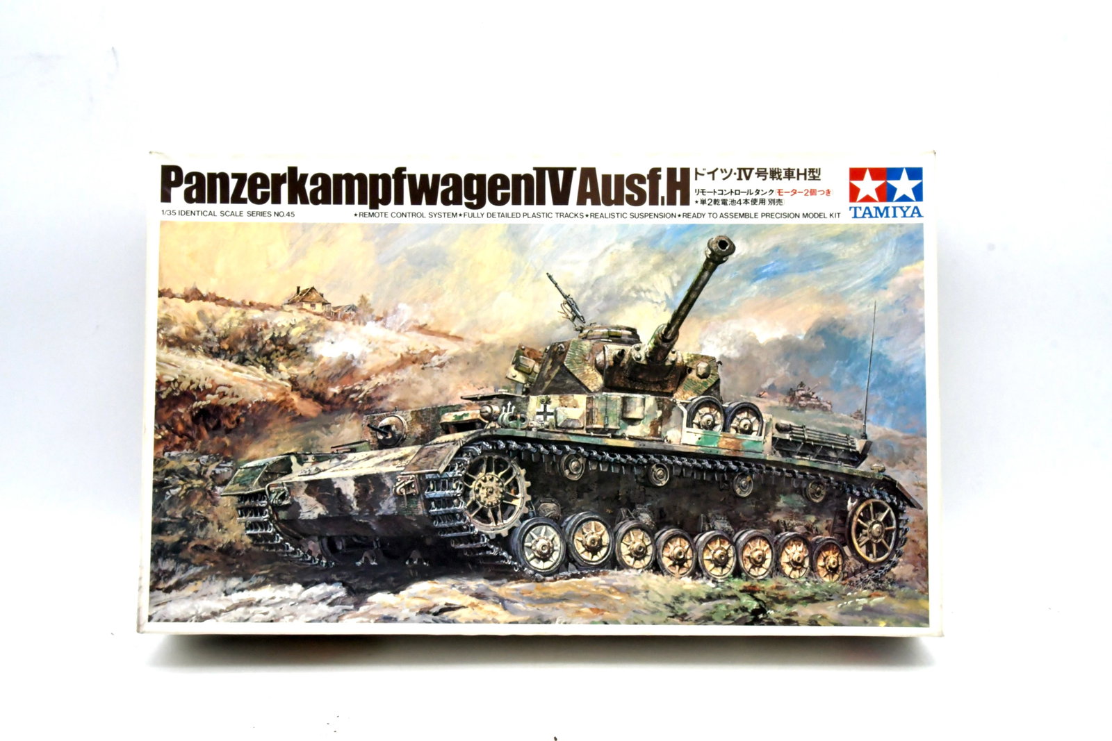 Tamiya Panzer IV Ausf.H 1/35 RC Tank Kit: Tamiya 1/35 scale German PanzerkampfwagenIV AusführungH plastic model kit from the Identical Scale Series No.45. This is the classic wired remotecontrol / twinmotorized release, featuring the lat