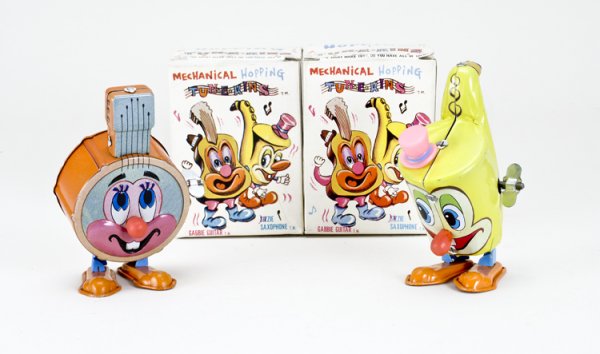 2 Wind-up Marx Hoping Instrument Toys in Boxes: Both maker marked and "Made in Japan". Both in correct boxes and work well.