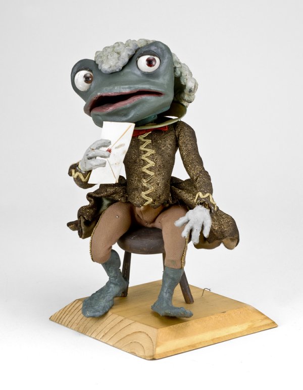Alice in Wonderland Early TV Promo Prop: 10" tall dressed Frog from a Louis Bunin production, Punch Films, Inc. Was used for CBS television short film Alice in Wonderland. Previously sold at a Christie's auction.