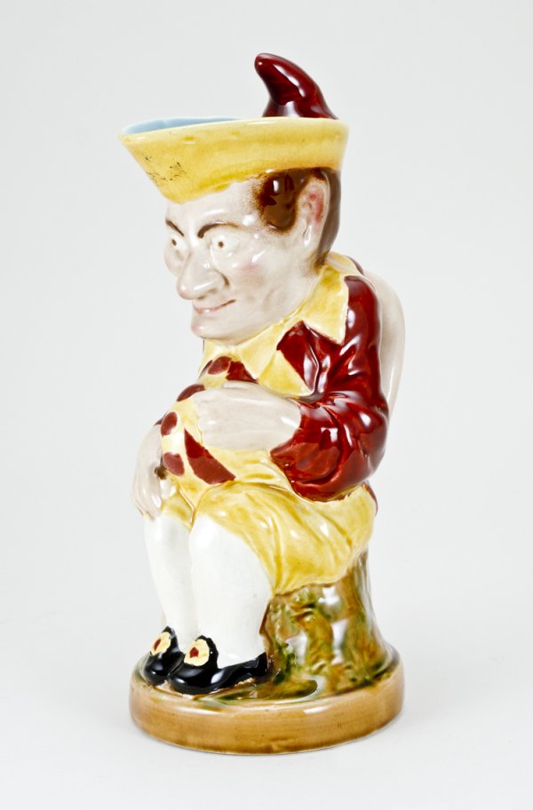 Majolica Punch Pitcher: Of Punch and Judy, 13" tall, marked "Sarreguemines".