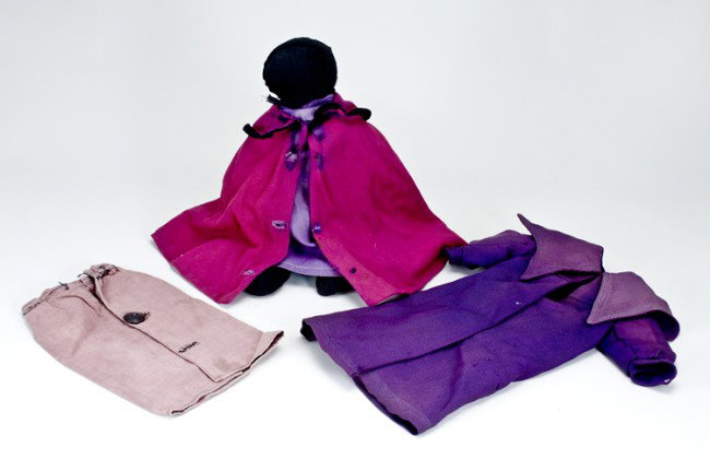 PA Amish Doll with Clothes: De-accessioned from The People's Place Museum in Intercourse, Pennsylvania. 13 1/2" dressed black face Amish doll, retaining museum identification note "Jacob Miller Clark, Missouri". Also mauve doll 