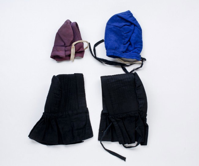 Vintage Amish Child's and Doll Bonnets: De-accessioned from The People's Place Museum in Intercourse, Pennsylvania. Lavender doll bonnet with silk interior, lined blue infant bonnet with museum identification tag from "Hamilton, Ind." and t