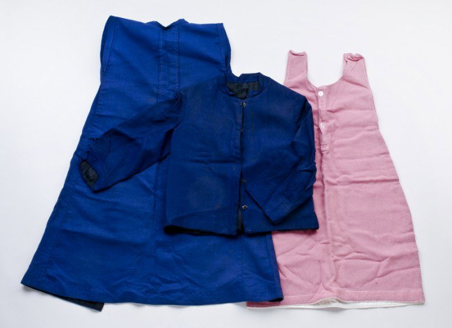 Vintage PA Amish Children's Clothes: Toddler boy's lined jacket. De-accessioned from The People's Place Museum in Intercourse, Pennsylvania, with "Holme's County, Ohio" museum identification tag. Also, two toddler girl's pinafores. All w