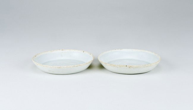 Ancient Chinese Dishes: 4 3/4" diameter. Labeled as: Yingquing Carved Dish, Sung Dynasty Circa 13th Century. From a collection of Chinese Sung, Tang and Han Dynasty pottery, all originating from the construction site of the