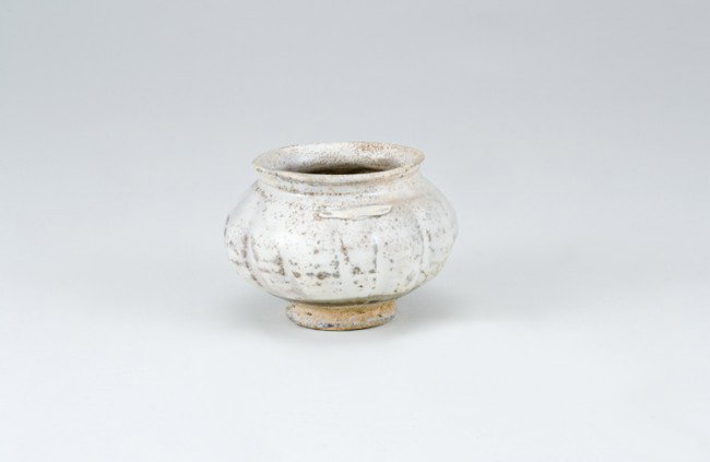 Ancient Chinese Jar: Opening diameter 2 1/2", base diameter 1 5/8". From a collection of Chinese Sung, Tang and Han Dynasty pottery, all originating from the construction site of the Three Gorges Dam in China.