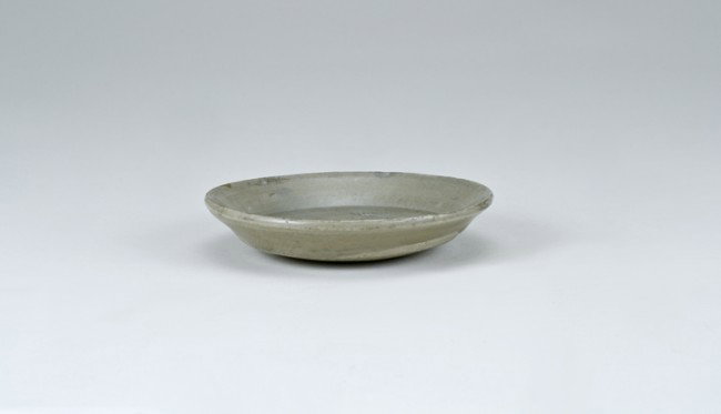 Ancient Chinese Dish: 4" diameter. Labeled as: Northern Sung, 10th-11th Century, Olive Celadon. From a collection of Chinese Sung, Tang and Han Dynasty pottery, all originating from the construction site of the Three Gorge