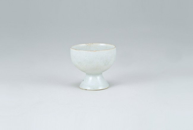 Ancient Chinese Cup: Top diameter 2 3/8", base diameter 1 1/2". Labeled as: Ching-Pai Stemmed Cup, Southern Sung Dynasty, 12th Century. From a collection of Chinese Sung, Tang and Han Dynasty pottery, all originating from