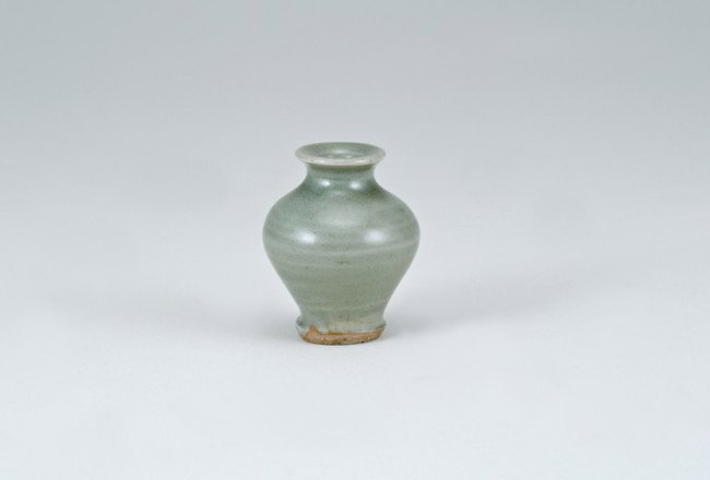 Ancient Chinese Celadon Jar: Top opening 1", base diameter 1", 2 1/8" tall. Labeled as: 13th-14th Century, Long Quan? From a collection of Chinese Sung, Tang and Han Dynasty pottery, all originating from the construction site of 
