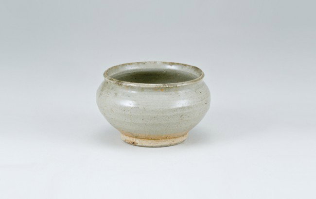 Ancient Chinese Jar: Opening diameter 3 1/4", base diameter 2 1/4". From a collection of Chinese Sung, Tang and Han Dynasty pottery, all originating from the construction site of the Three Gorges Dam in China.