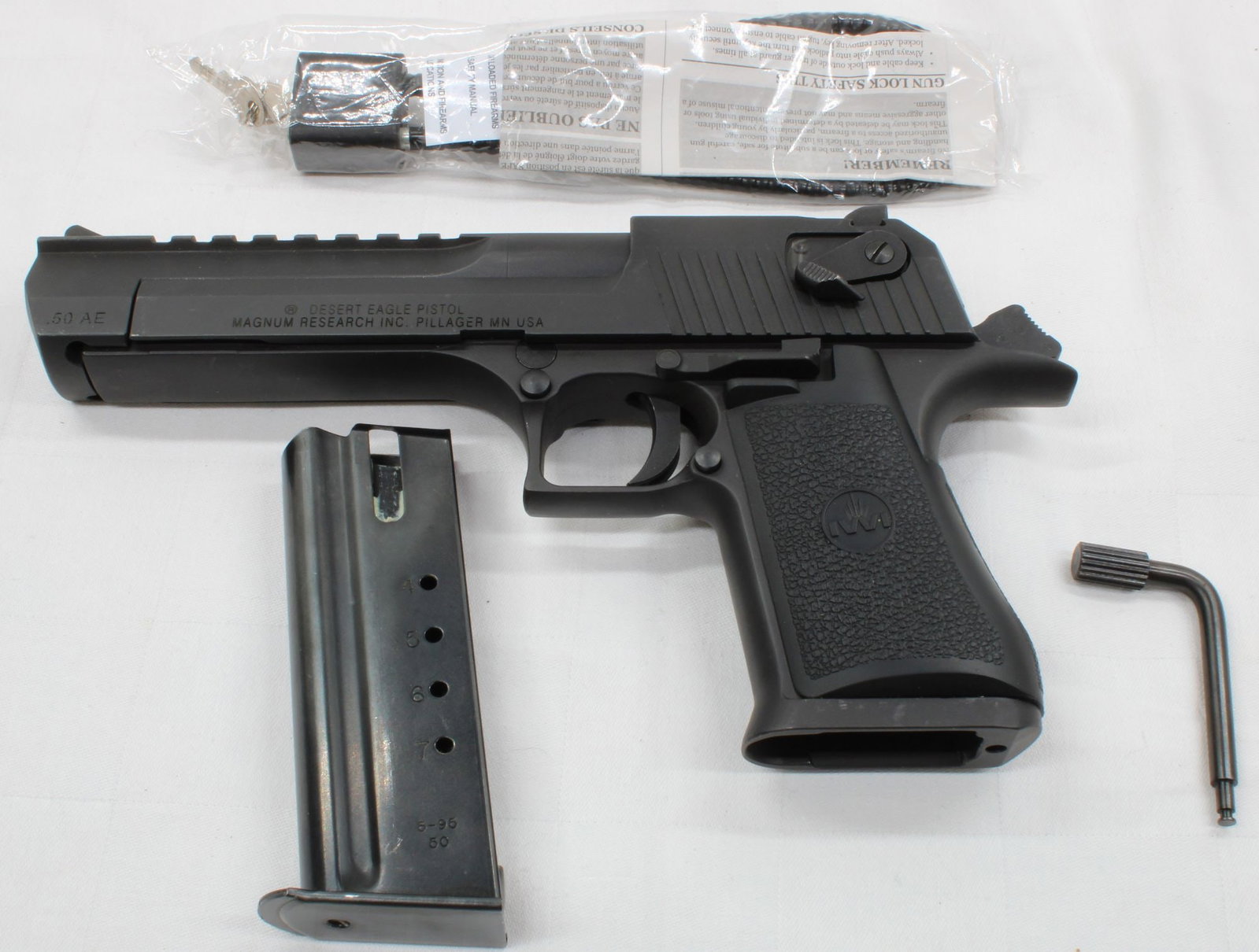 Israel Military Industries Desert Eagle .50 AE Semi-Automatic Pistol, S/N 43202607, w/ Box, Magazine: Israel Military Industries Desert Eagle semi-automatic pistol chambered in .50 Action Express. Features large-frame gas-operated design with matte finish and fixed sights. Includes one magazine, origi