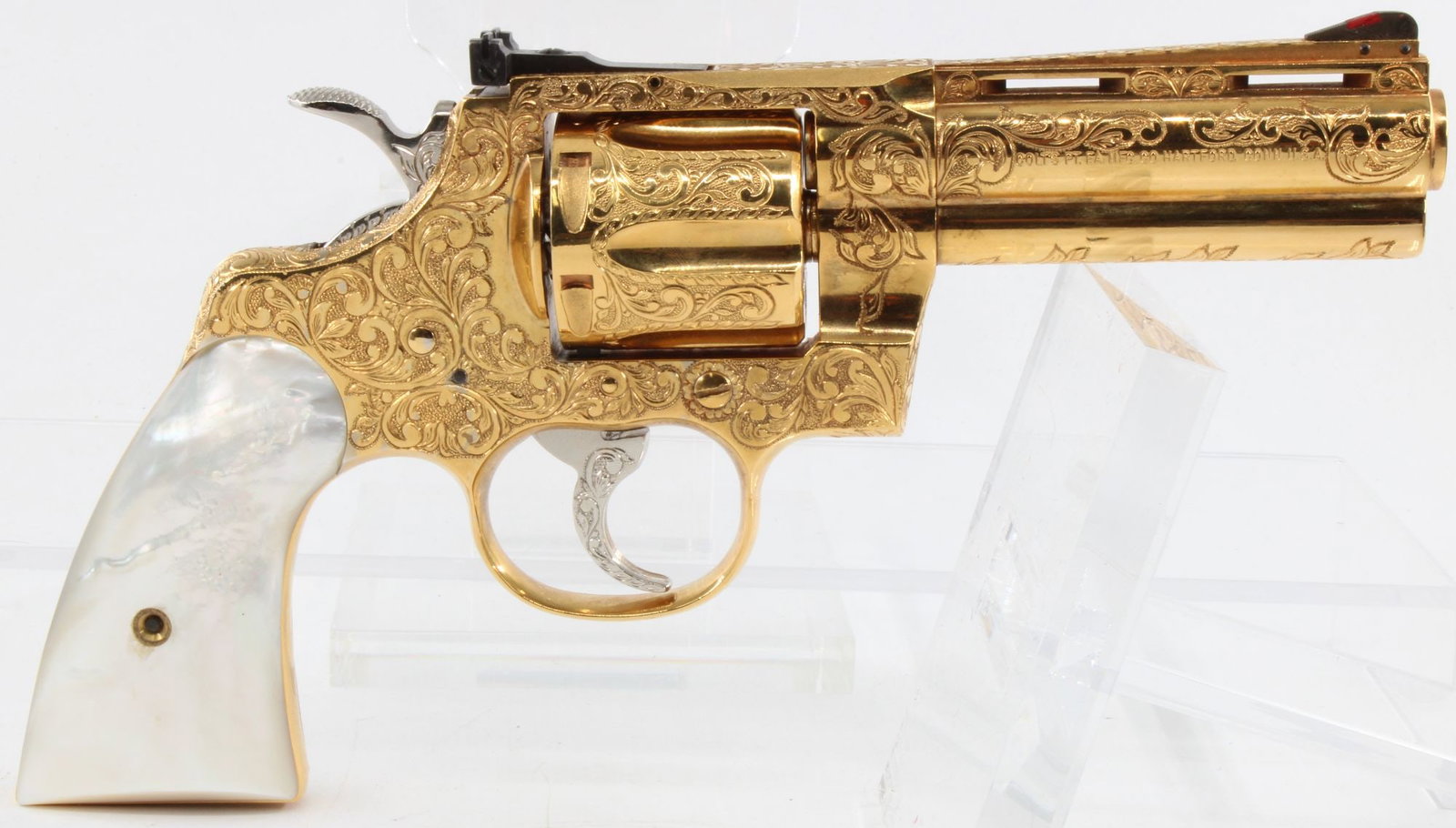 Colt Python .357 Magnum Double Action Revolver, Fully Engraved & Signed BAS, MOP Grips Gold-Plated,: Colt Python double action revolver chambered in .357 Magnum. Manufactured in 1972 and subsequently fully engraved with signature marked "ENGRAVED BY BAS" beneath the right grip. Features gold-plated f