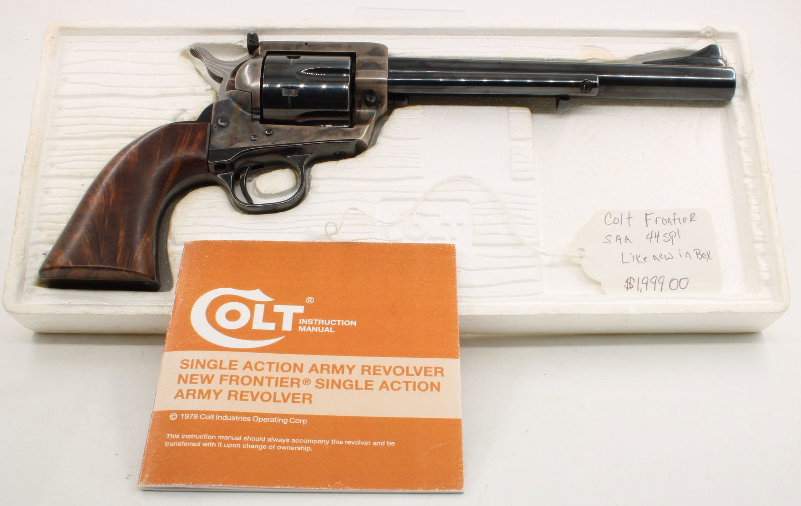Colt .44 Special New Frontier Single Action Army S/N: 06275NF 7.5" barrel original box: Colt New Frontier Single Action Army revolver chambered in .44 Special, 3rd Generation, S/N 06275NF, manufactured 1980. Features a 7.5" barrel with Royal Blue finish and color case-hardened frame. Fit