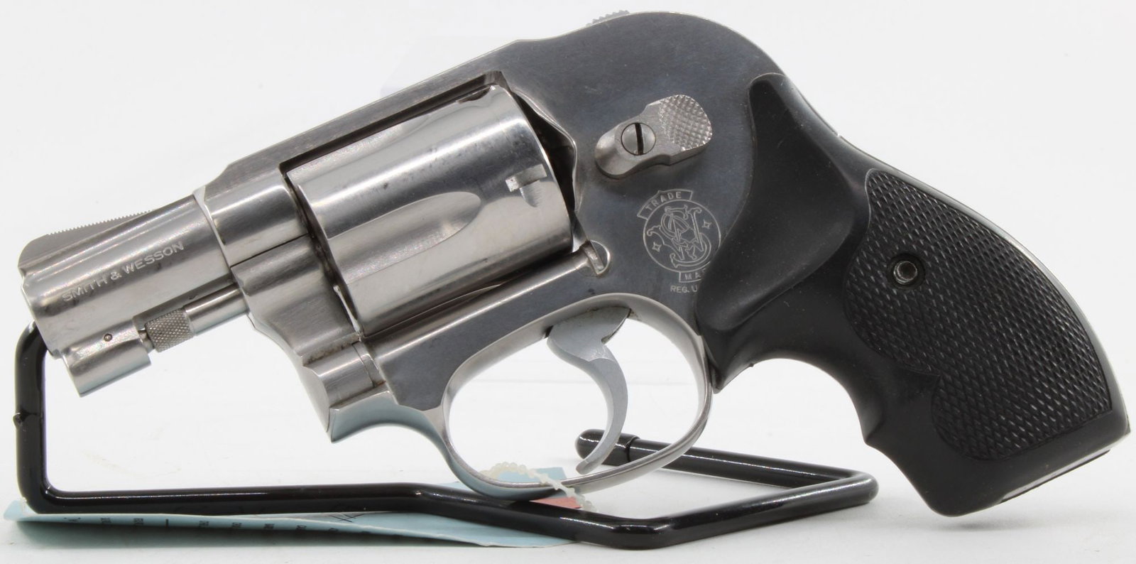 Smith & Wesson Model 649 .38 Special Double Action Revolver w/ Box: Smith & Wesson Model 649 double-action revolver chambered in .38 Special with 5-shot cylinder and short barrel. Stainless steel J-frame revolver featuring shrouded hammer, fixed sights, and black synt