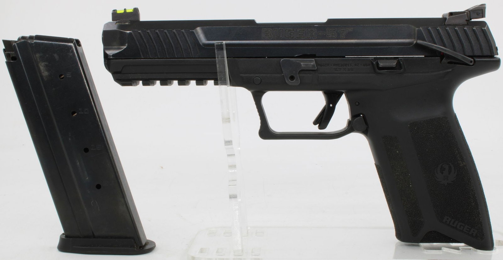 Ruger-57 5.7x28mm Semi-Automatic Pistol w/ Magazine: Ruger-57 semi-automatic pistol chambered in 5.7x28mm with full-size polymer frame and matte black slide. Features single-action internal hammer-fired operation, fiber optic front sight, adjustable rea