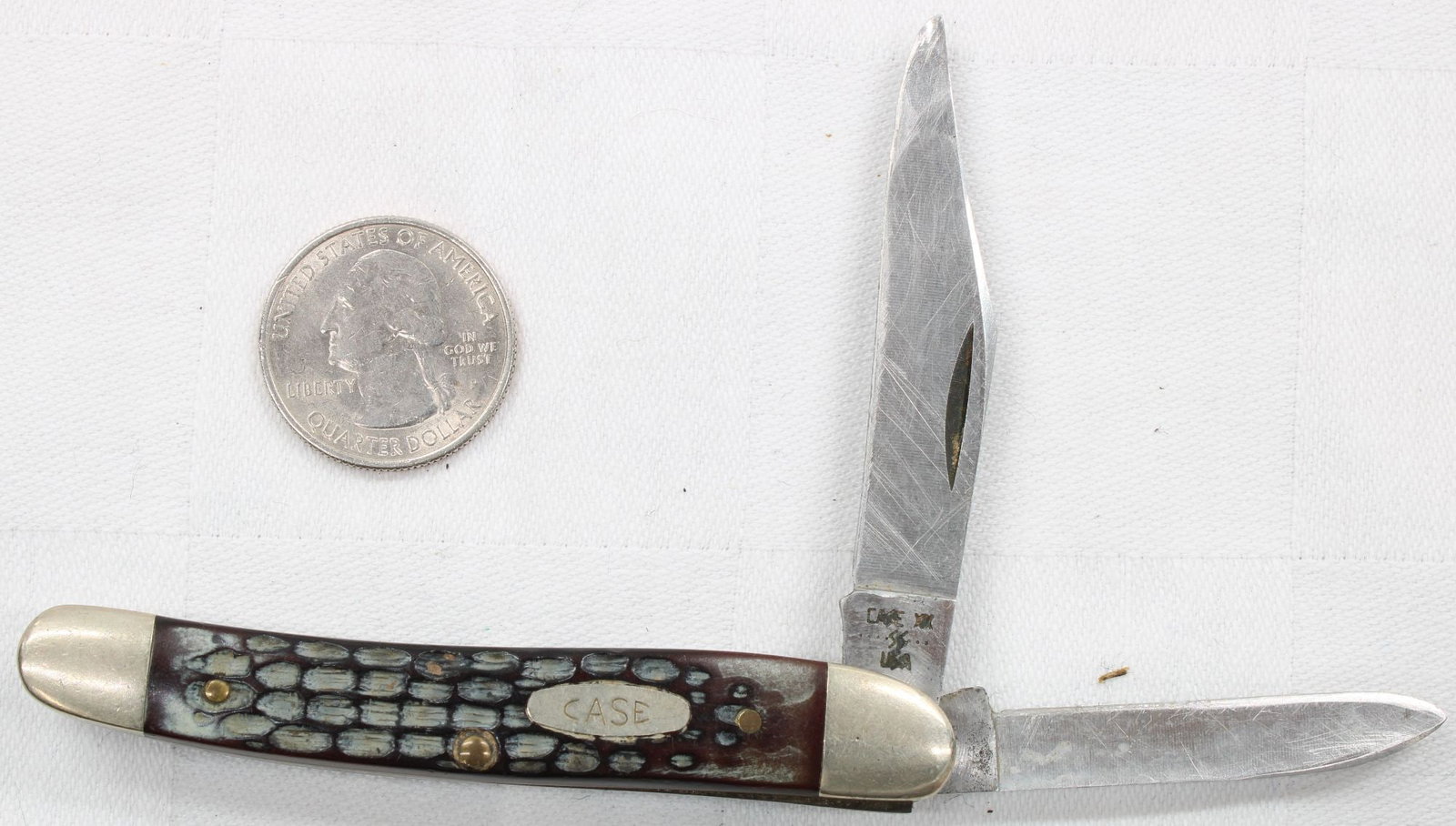 Case Folding Pocket Knife- 2 Blade: Two-blade folding pocket knife with jigged synthetic handles featuring a gray/blue worn bone-style pattern and nickel silver bolsters. Tang stamped Case XX. Includes clip and pen blades. Blades show n