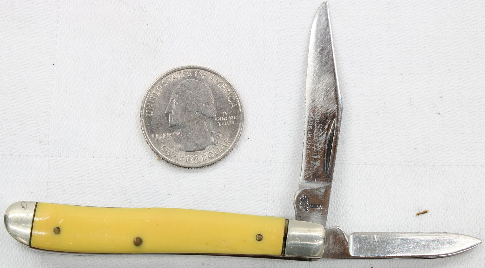 Queen Steel #17 Folding Pocket Knife- 2 Blade: Vintage two-blade folding pocket knife manufactured in Korea, featuring yellow synthetic handles with polished bolsters and brass pins. Includes clip point main blade and secondary pen blade. Blades s
