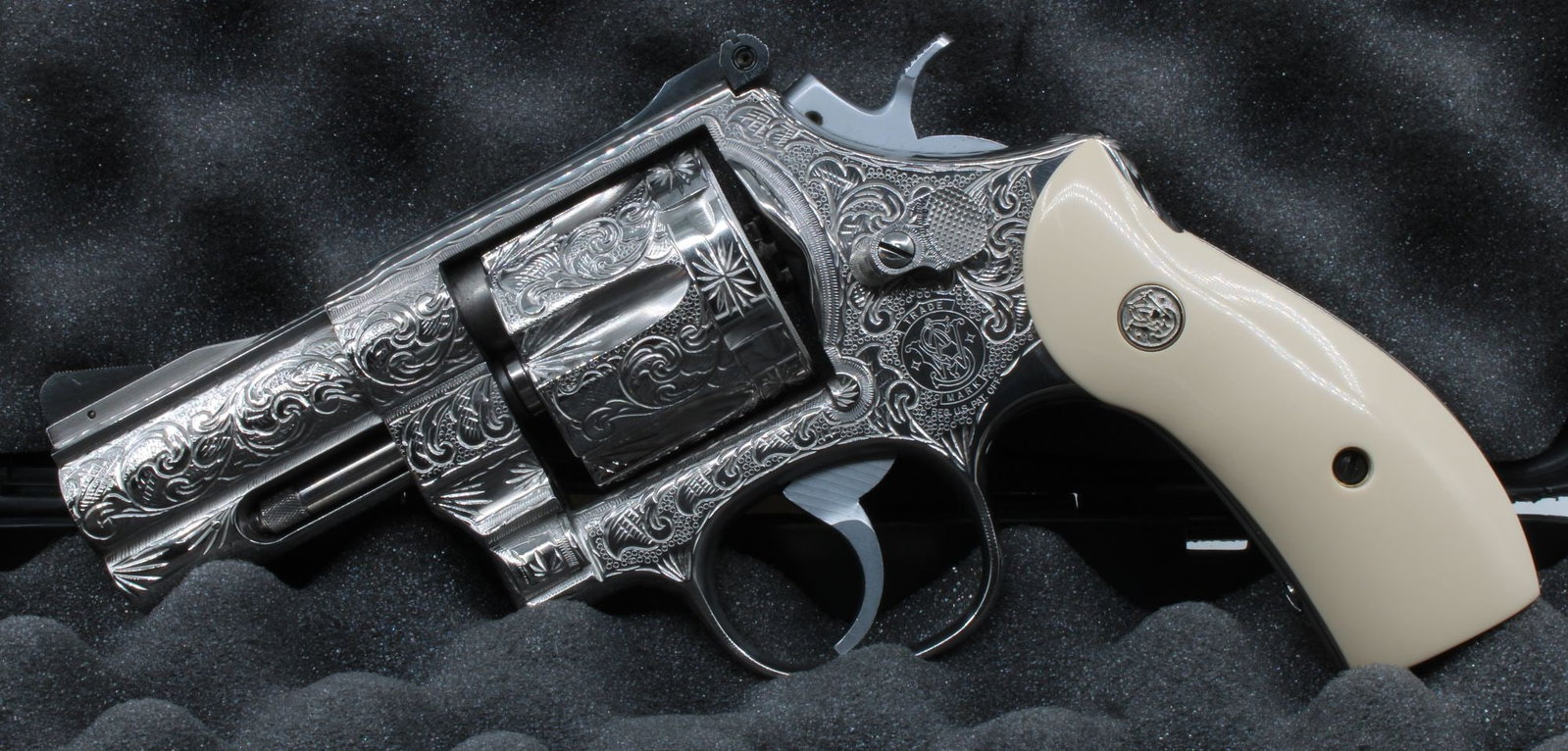 Smith & Wesson Model 625-3 .45 ACP Double Action Revolver — S/N BEN7295 Fully Engraved by Hunter: Smith & Wesson Model 625-3 "Model of 1989" double action revolver, .45 ACP, 3" barrel, stainless steel. Fully engraved overall in dense American scroll with starburst accents by Hunter Flannery of Jef