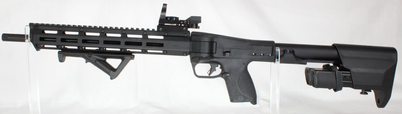 Smith & Wesson MP FPC 9mm Luger Folding Pistol Carbine with Holographic Sight, Case, Sling and: Smith & Wesson MP FPC (Folding Pistol Carbine) semi-automatic rifle chambered in 9mm Luger. Smith & Wesson Military & Police platform representing quality American manufacturing. The FPC features a fo