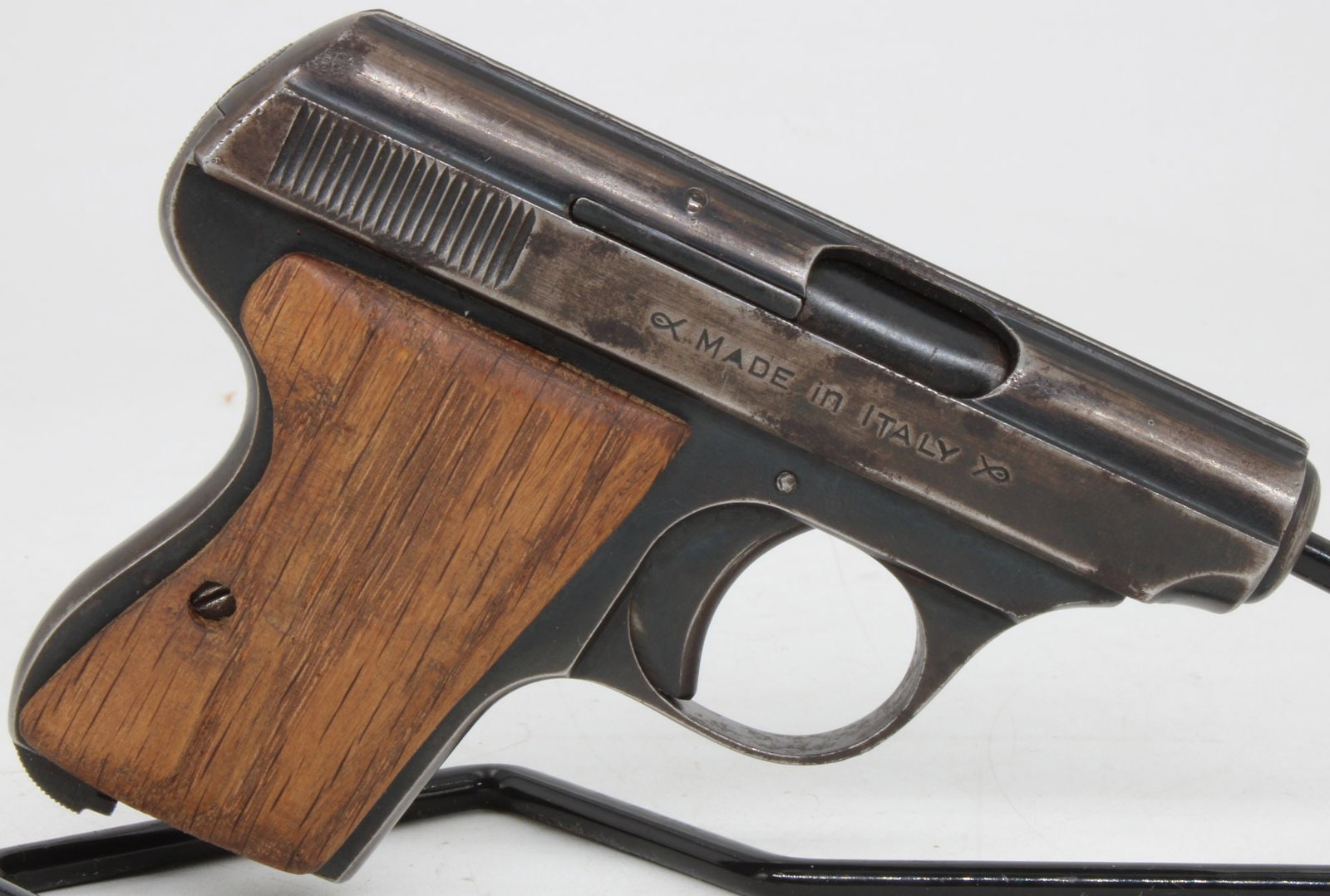 Rigarmi .25 ACP Semi-Automatic Pocket Pistol w/ Case: Rigarmi semi-automatic pocket pistol chambered in 6.35mm (.25 ACP), manufactured in Brescia Brescia, Italy. Compact blowback-operated pistol featuring blued finish, fixed sights, and grip panels with 