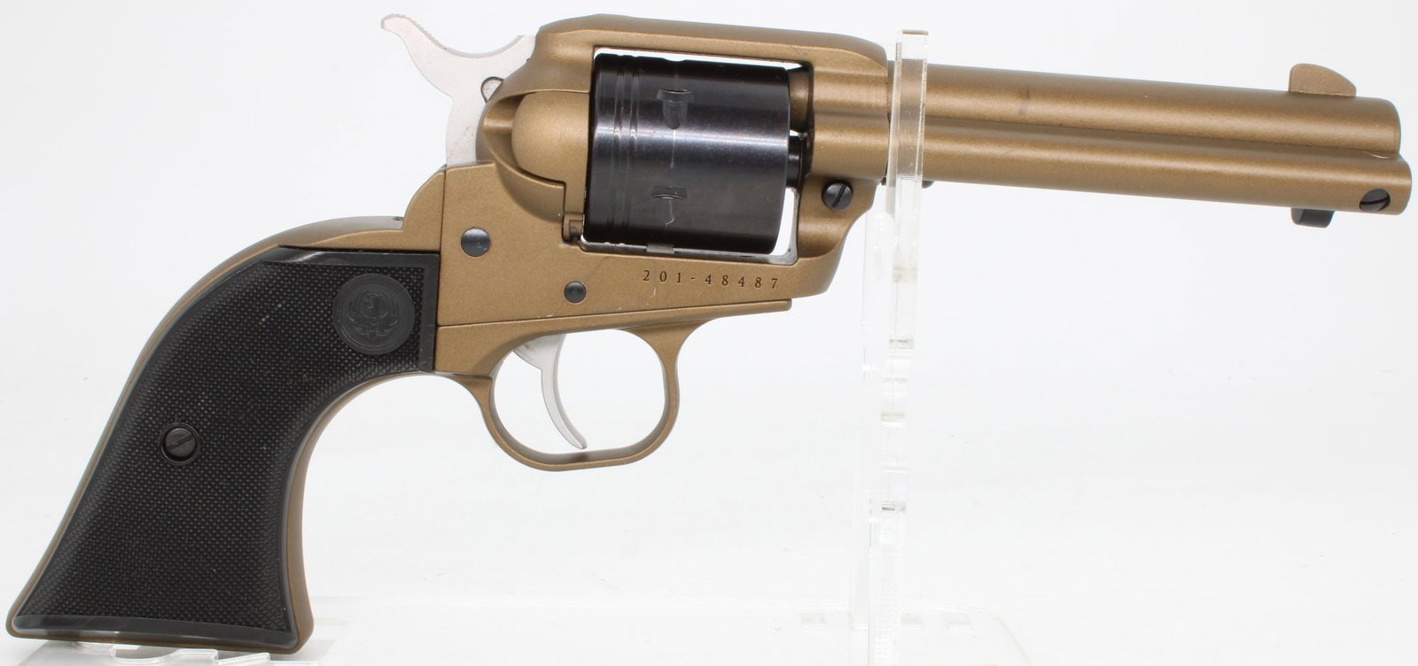Ruger Wrangler .22 LR Single Action Revolver, Bronze Finish: Ruger Wrangler single-action revolver chambered in .22 LR with 6-shot cylinder and approximately 4.62-inch barrel. Features durable bronze Cerakote finish, fixed sights, alloy frame, and checkered bla