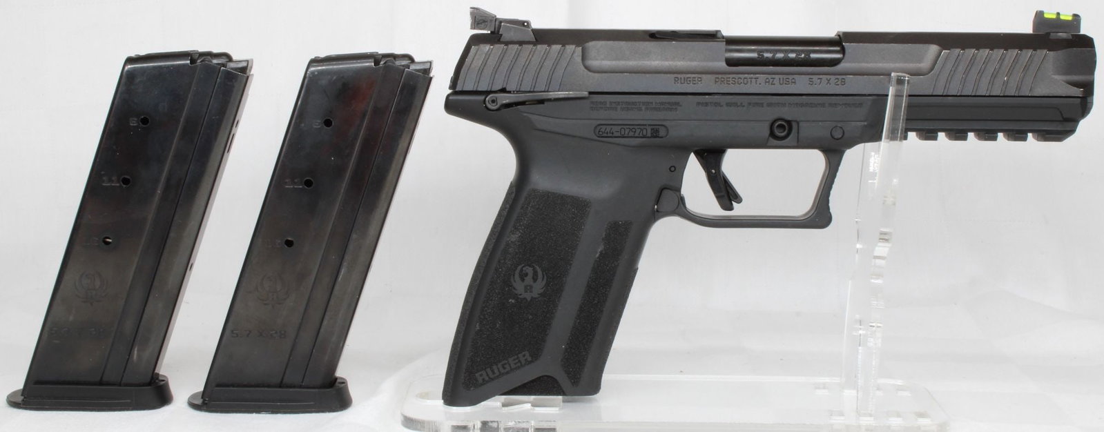 Ruger-57 5.7x28mm Semi-Automatic Pistol w/ Box: Ruger-57 semi-automatic pistol chambered in 5.7x28mm with full-size polymer frame and matte black slide. Features single-action internal hammer-fired operation, fiber optic front sight, adjustable rea