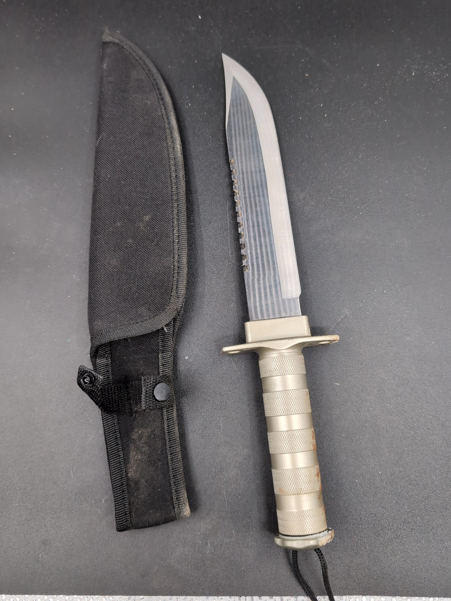 Fixed Blade Survival Knife with Serrated Spine and Sheath (1 of 4)