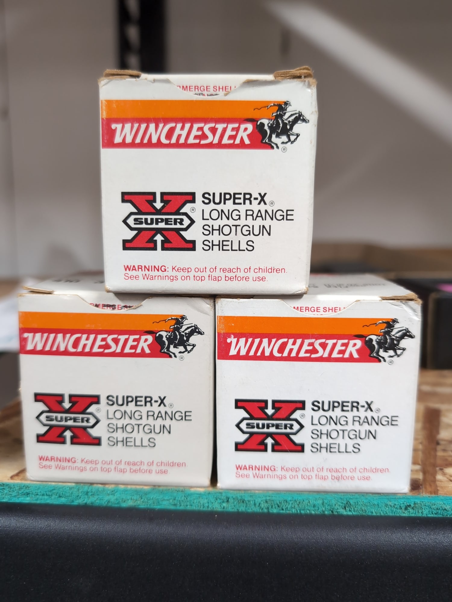 Three Boxes of Winchester Super-X .410 Gauge Shotgun Shells: A lot consisting of three boxes of Winchester Super-X Long Range shotgun shells. Each box is specified as .410 gauge, 3-inch length, with 11/16 oz. of 7 1/2 shot, load X413.