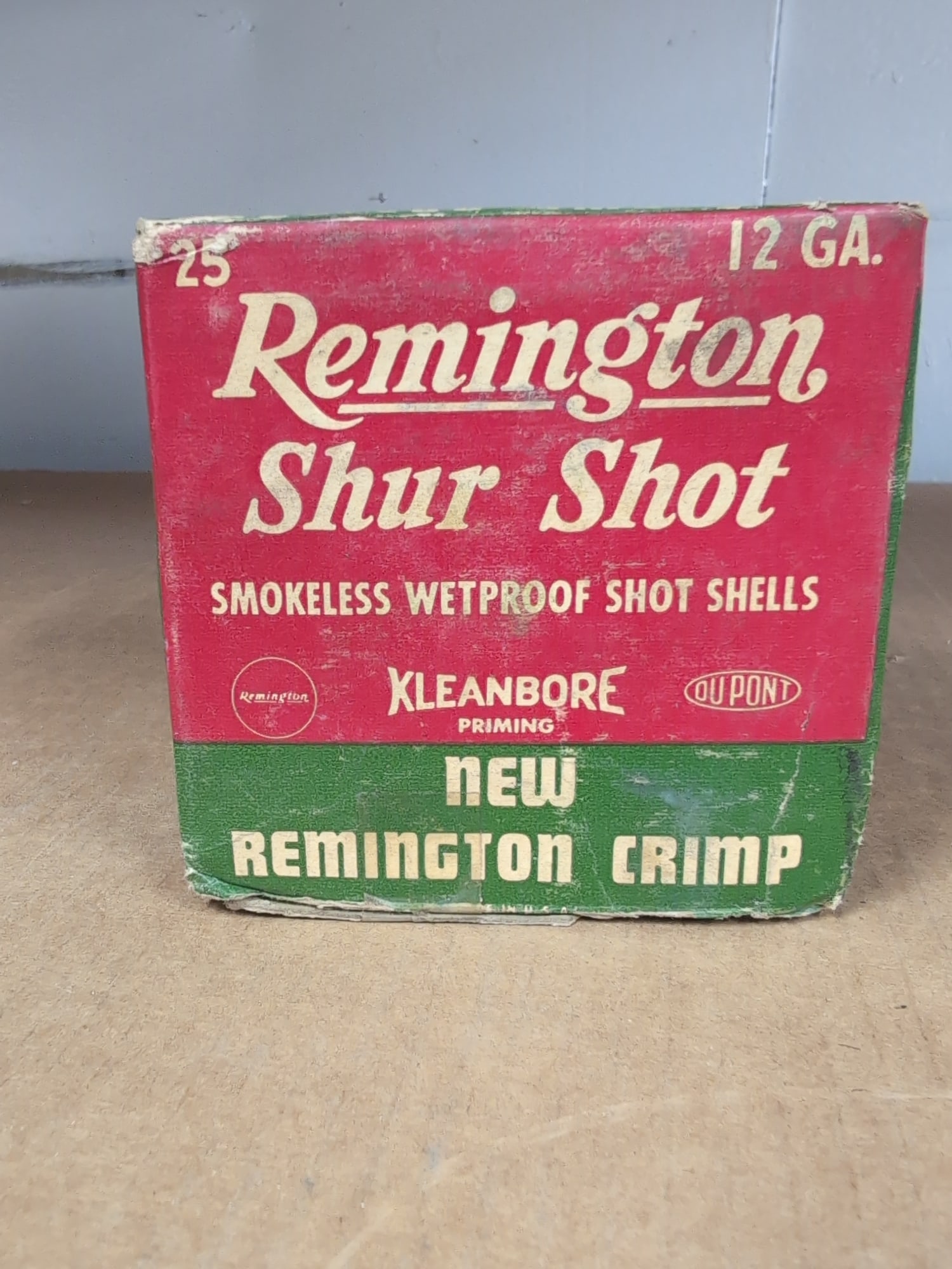 Remington Shur Shot 12 Gauge Shot Shell Box: A cardboard box for 25 Remington Shur Shot 12 gauge smokeless wetproof shot shells. The packaging features Kleanbore priming and Remington Crimp technology, with graphics illustrating the shell design