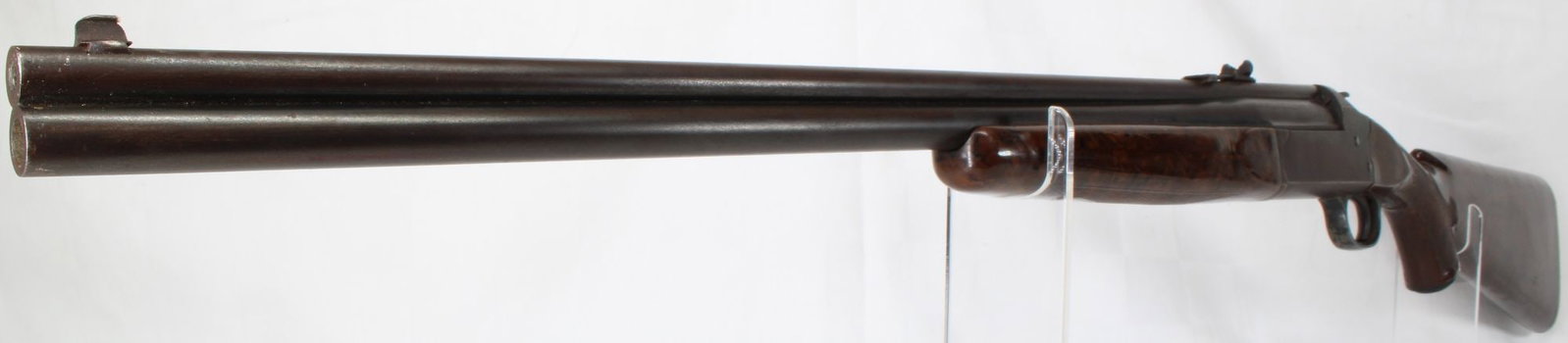 Stevens .22 LR/.410 Bore Over/Under Combination Rifle/Shotgun, Synthetic Stock, No Serial Number: Stevens over/under combination firearm featuring a .22 LR rifle barrel over a .410 bore shotgun barrel in a break-open configuration. Fitted with synthetic stock. No serial number marked — consisten