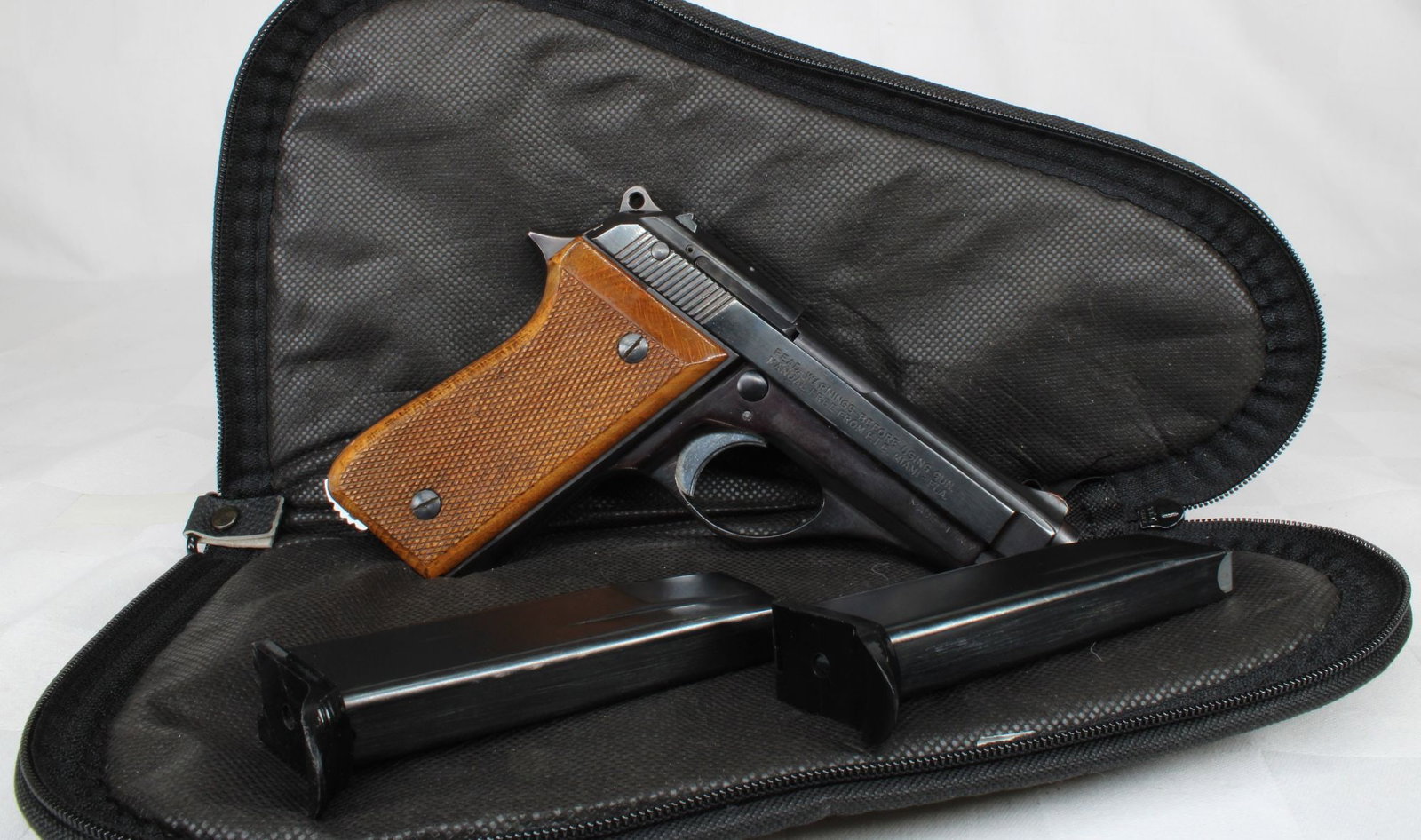 F.I.E. Super Titan .380 ACP Semi-Automatic Pistol, S/N MB02431, w/ Magazine & Soft Case: F.I.E. Super Titan semi-automatic pistol chambered in .380 ACP. Features a double-action/single-action trigger, all-steel construction, and a classic European pocket pistol profile. Manufactured by Ta