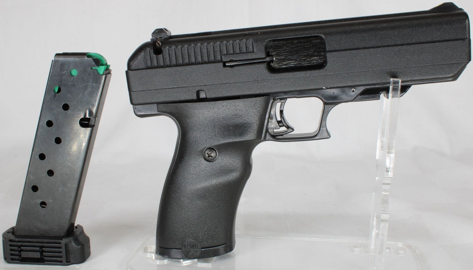 Hi-Point JCP .40 S&W Semi-Automatic Pistol, S/N X7133795, w/ Magazine: Hi-Point JCP semi-automatic pistol chambered in .40 S&W. Features a polymer frame, last-round bolt hold-open, and Hi-Point's single-stack design with a 4.5" barrel. Known for its durability and straig