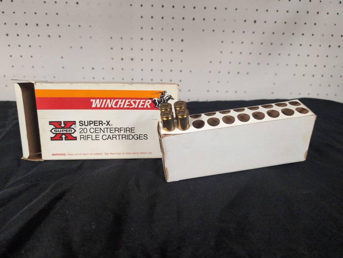 Winchester Super-X 300 Winchester Magnum 220 Grain Silvertip Rifle Cartridges: A partial box of Winchester Super-X centerfire rifle cartridges, chambered in 300 Winchester Magnum. The ammunition features 220 grain Silvertip projectiles. The lot includes the original packaging an