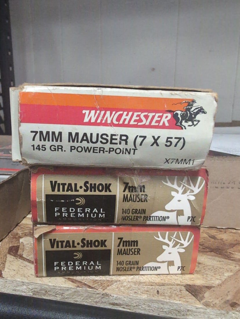 Assorted 7mm Mauser Ammunition Lot 48 rounds: A collection of 7mm Mauser (7x57) ammunition including one box of Winchester 145 grain Power-Point cartridges and two boxes of Federal Premium Vital-Shok 140 grain Nosler Partition cartridges. The lot