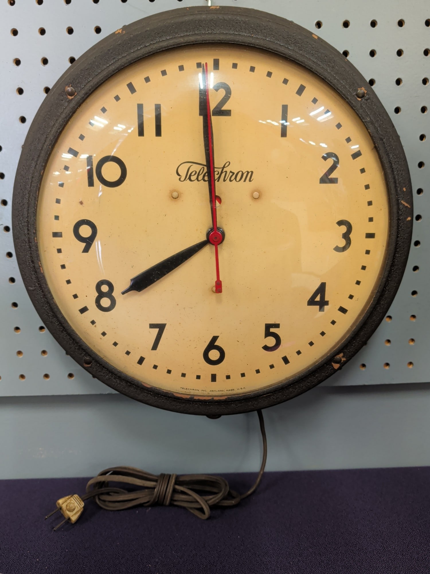 Telechron Electric Industrial/School Wall Clock, 1: Vintage Telechron electric wall clock with a black painted metal case, convex glass crystal, and cream-colored dial with bold Arabic numerals. Manufactured by Telechron Inc., Ashland, Massachusetts, t