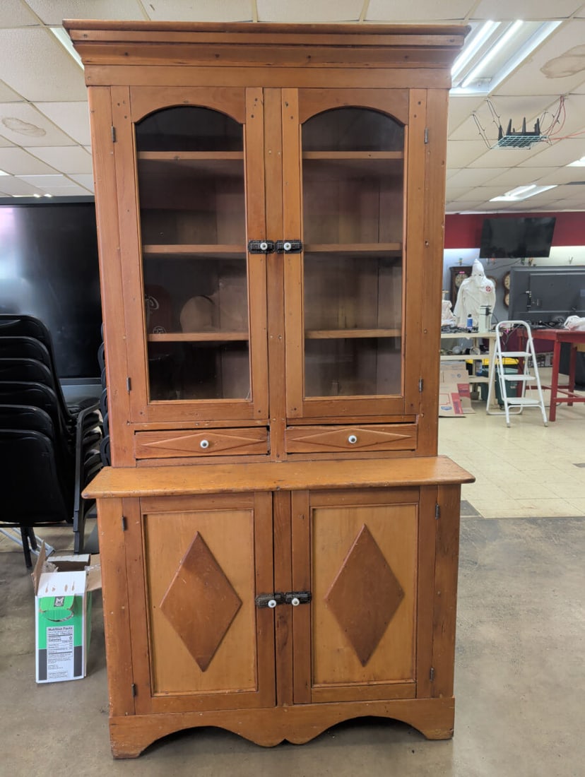 19th Century Primitive Step-Back Cupboard with Glazed Doors: Antique American country step-back cupboard, constructed of pine or mixed softwoods and retaining an attractive warm aged surface. Upper section features a substantial molded cornice above a pair of
