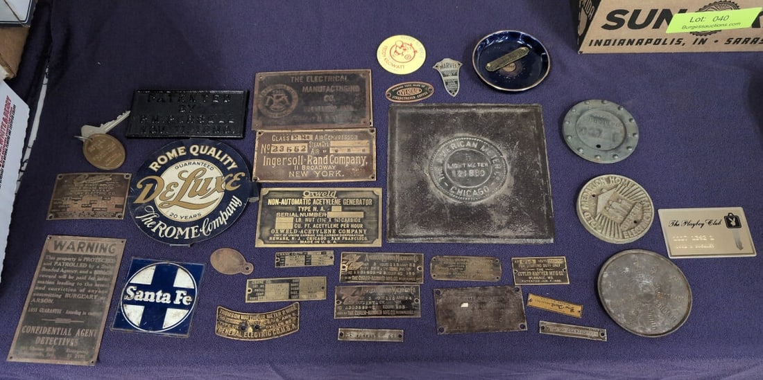 Assorted Collection of Industrial Nameplates, Tags, and Advertising Signs: Group lot featuring a diverse assortment of industrial nameplates, equipment serial number tags, metal advertising signs, tokens, and utility markers. Includes pieces from manufacturers such as