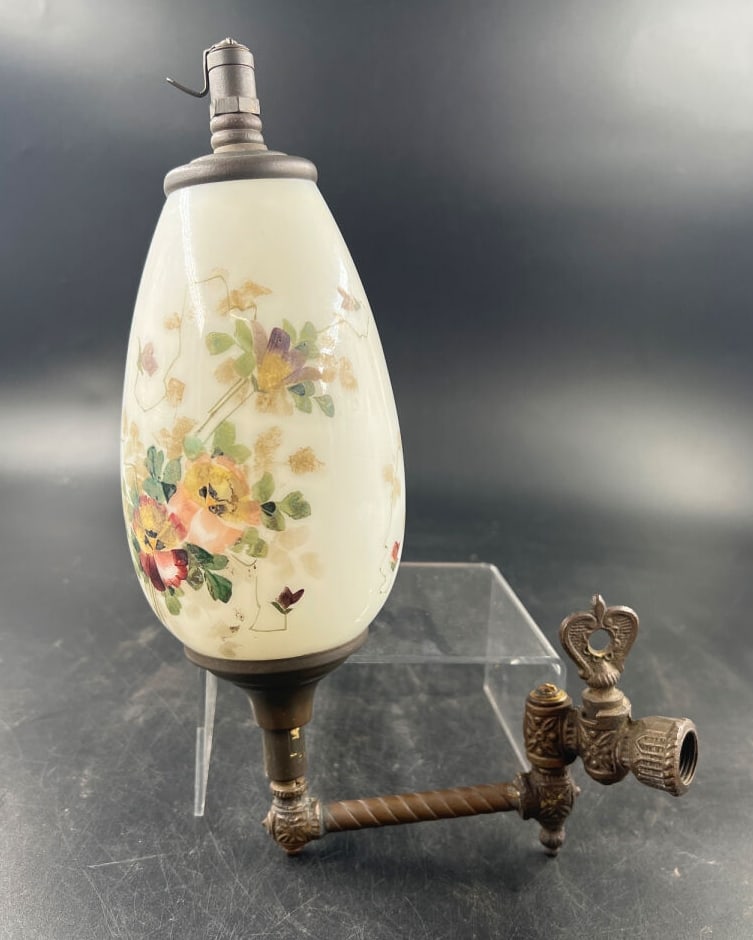 Victorian Gas Light Fixture with Hand-Painted Milk Glass Shade and Brass Bracket: Victorian era gas light fixture featuring a teardrop-shaped milk glass shade decorated with hand-painted polychrome floral motifs including pansies and foliage. The fixture includes a decorative cast 