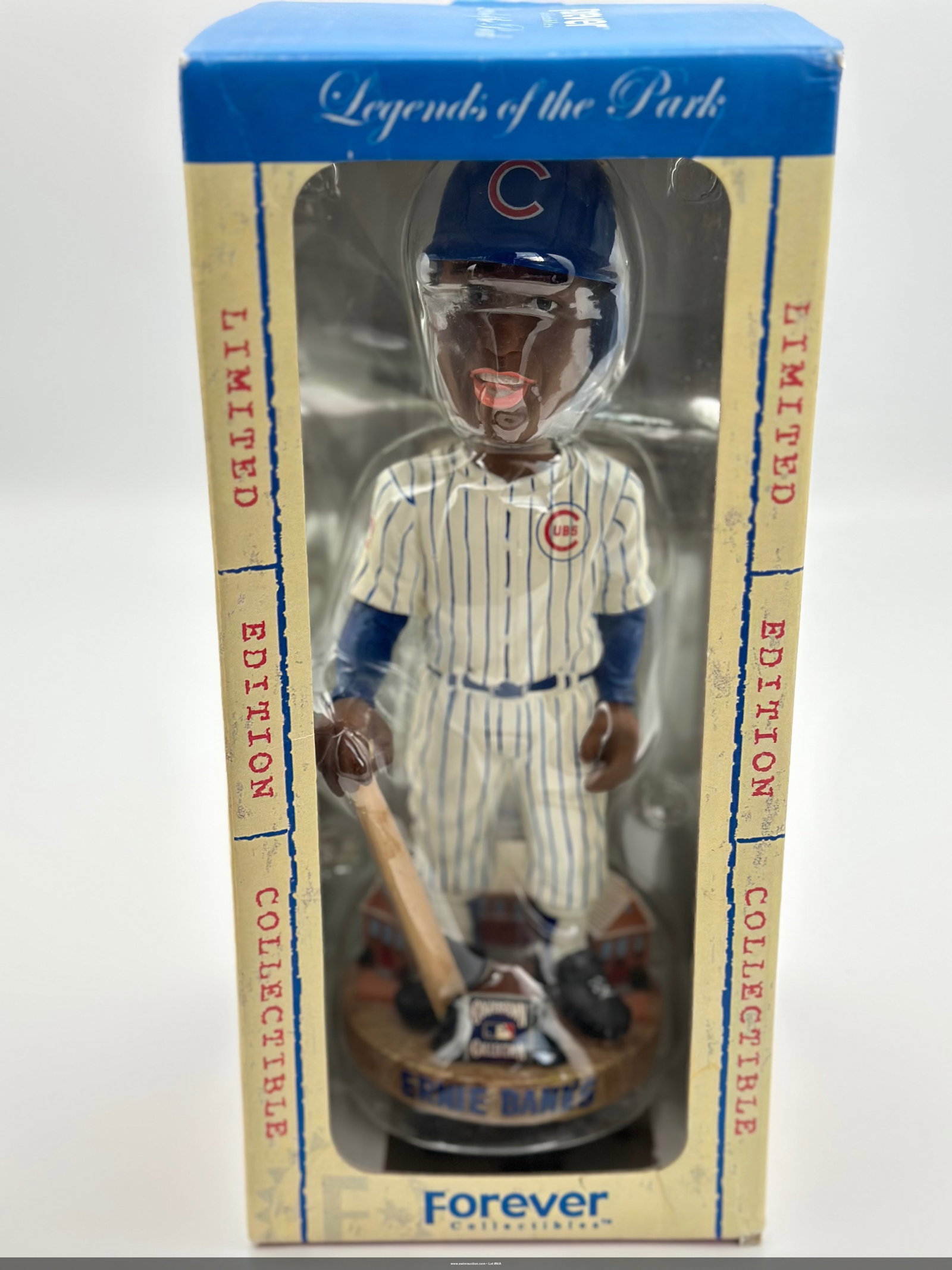 From a Private Estate of a Lifelong Collector & Physician-Sports Legends and Collectibles: Forever Collectibles "Legends" Ernie Banks (HOF) Bobble Head NIBThis collectible bobblehead features baseball legend Ernie Banks in a Chicago Cubs uniform, complete with a bat and detailed base. Perfe