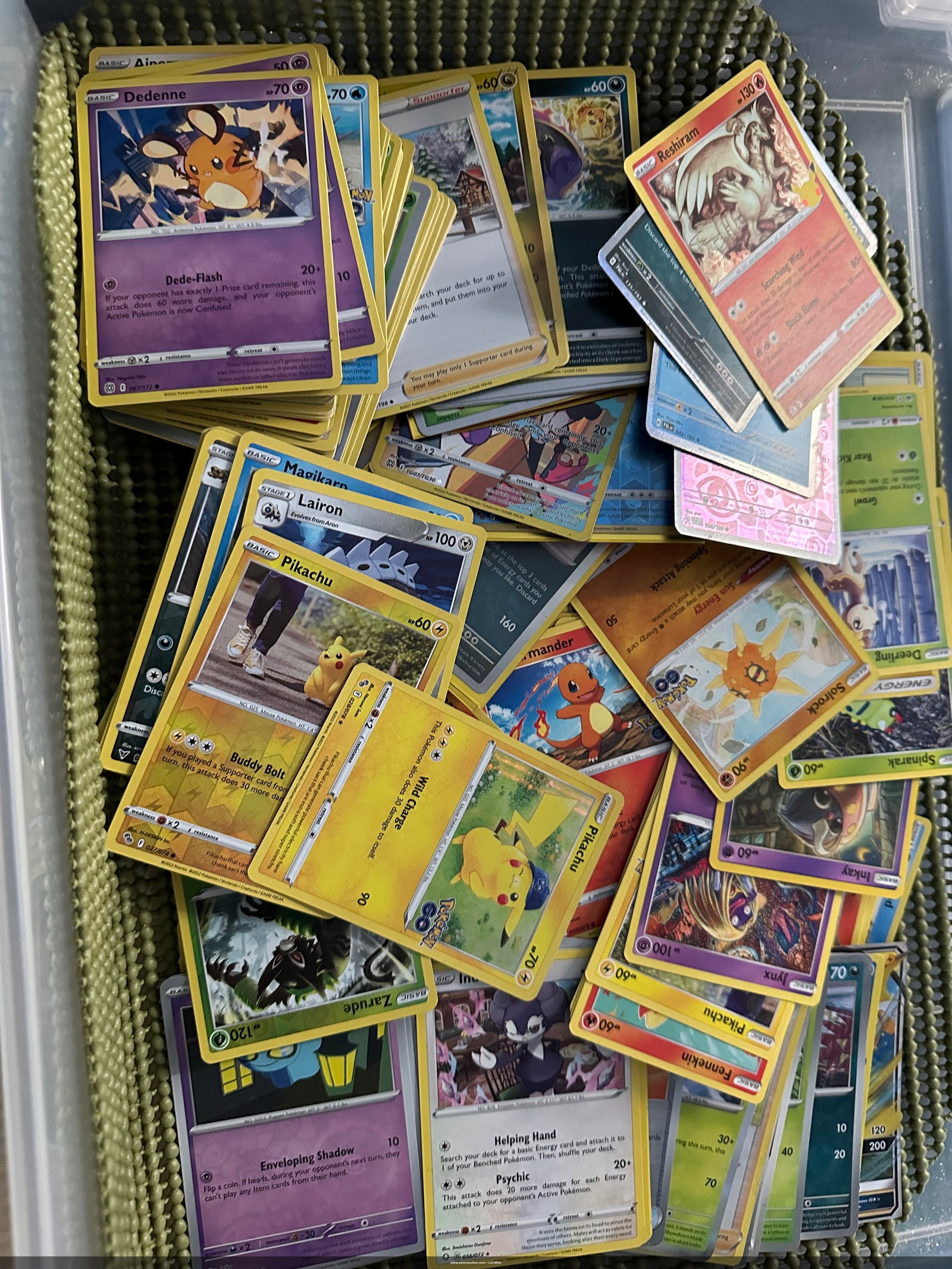 Pokemon Misc Found Small Tin - Some in Pokemon Red Sleeves: Found in box and unsorted but cards spread out and also stacked pulled to show a few in Tin.