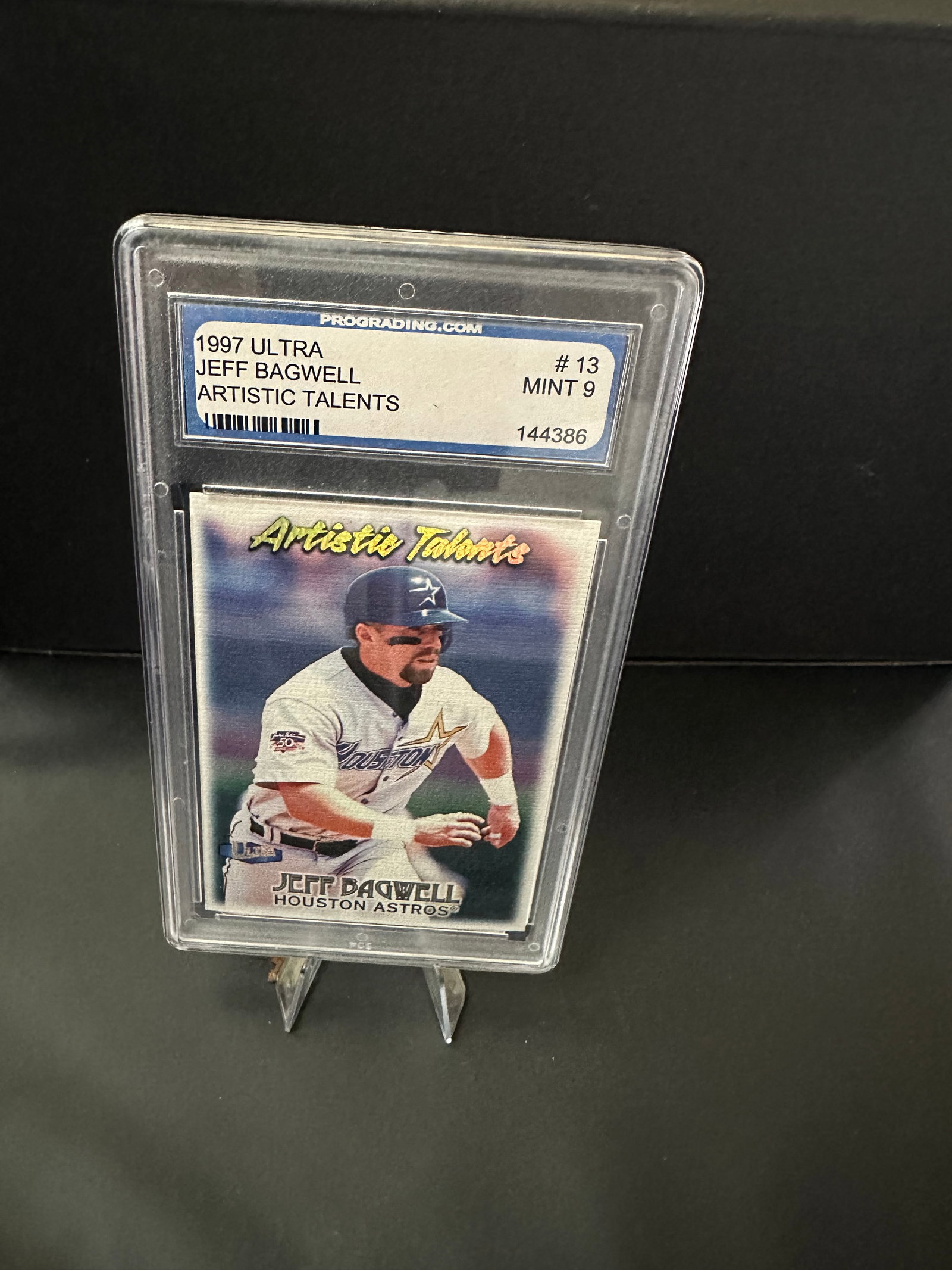 1997 Ultra Jeff Bagwell Artistic Talents Card: This listing features a 1997 Ultra trading card of Jeff Bagwell, noted for its 'Artistic Talents' series. Card number 13 is graded as Mint 9, showcasing Bagwell in his Houston Astros jersey. It is a v