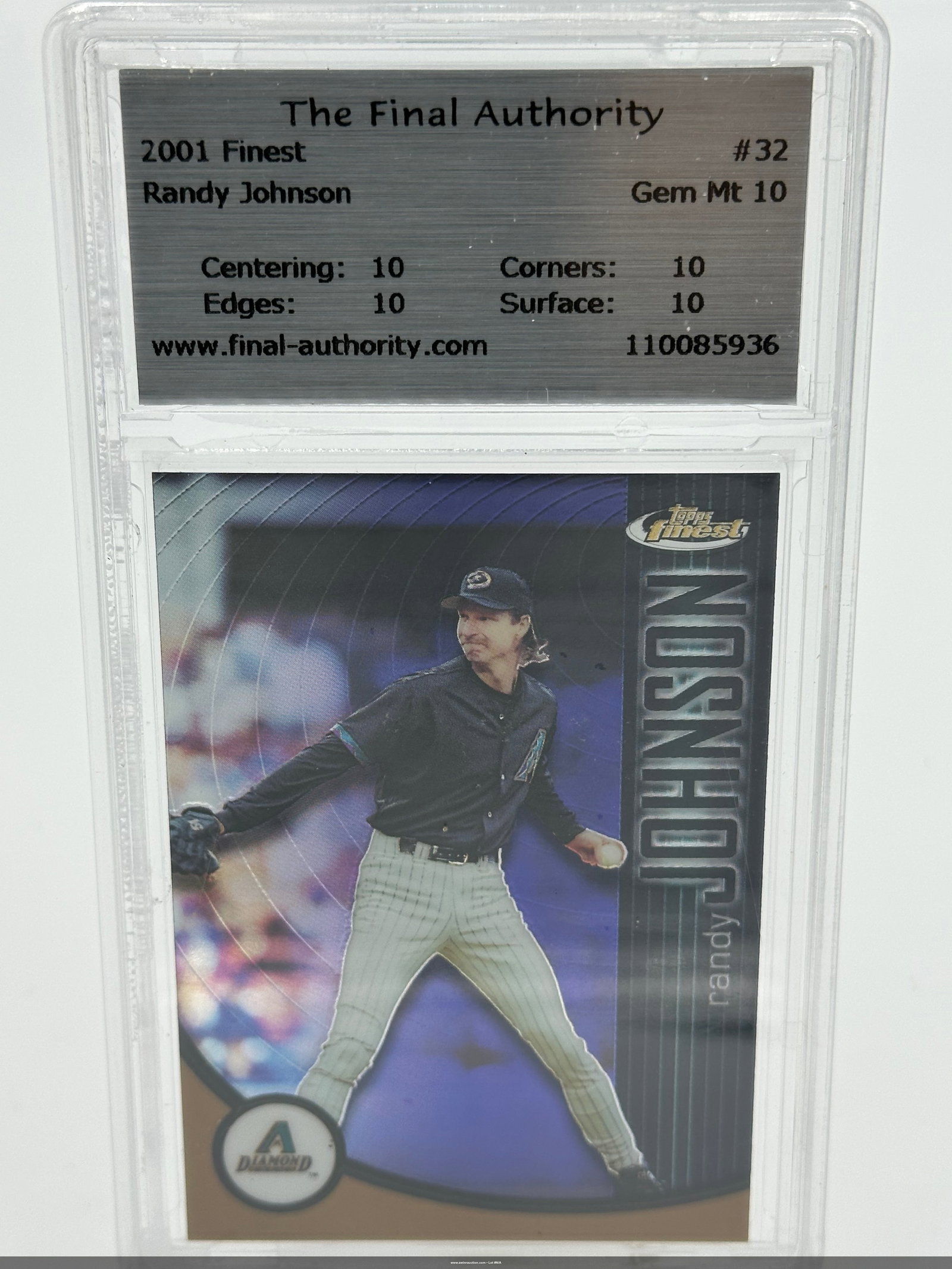 2001 Randy Johnson Topps Finest Baseball Card #32: 2001 Topps Finest Randy Johnson baseball card, numbered #32. The card features a stunning image of Johnson in his Arizona Diamondbacks uniform, showcasing his pitching stance. Graded Gem Mint 10, it h