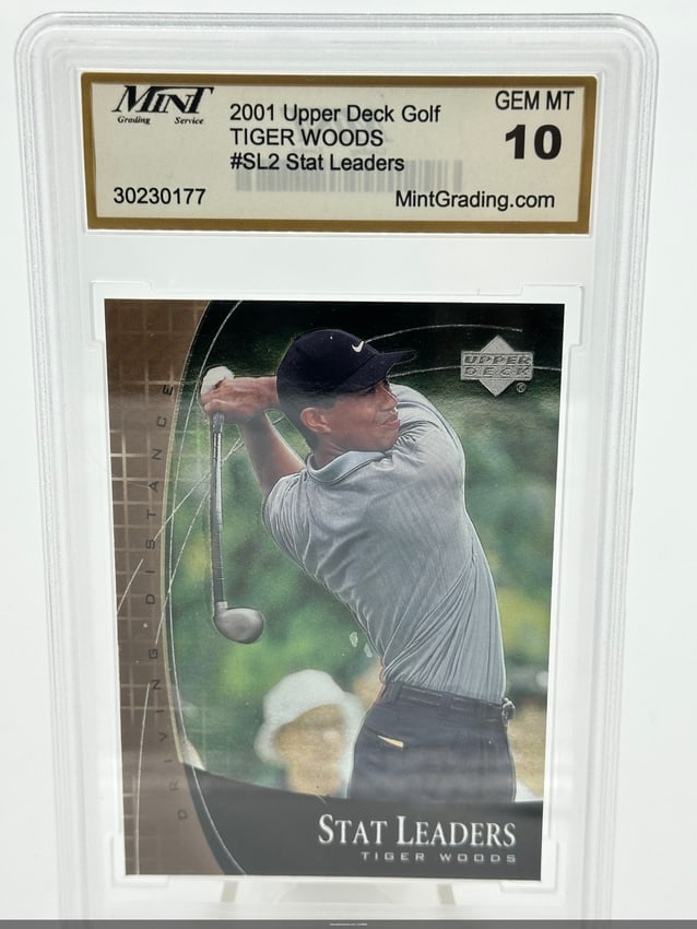 2001 Upper Deck Golf Tiger Woods #SL2 Gem Mint Card: a 2001 Upper Deck Golf trading card of Tiger Woods, labeled as #SL2 in the Stat Leaders series. It is graded GEM MT 10, indicating a perfect condition. The card displays Woods in a dynamic swing, high