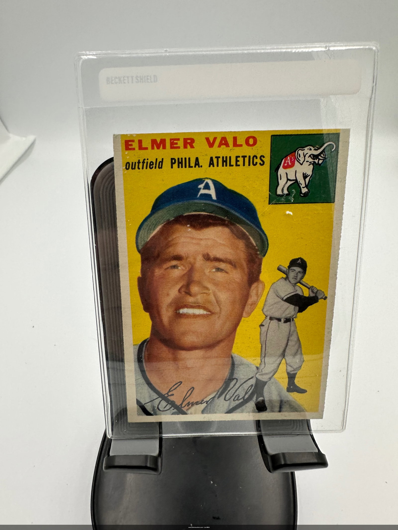 Elmer Valo Baseball Card - Philadelphia Athletics: Vintage baseball card featuring Elmer Valo, an outfielder for the Philadelphia Athletics. The card showcases a striking yellow background and includes an image of Valo.1954 Topps baseball card featuri