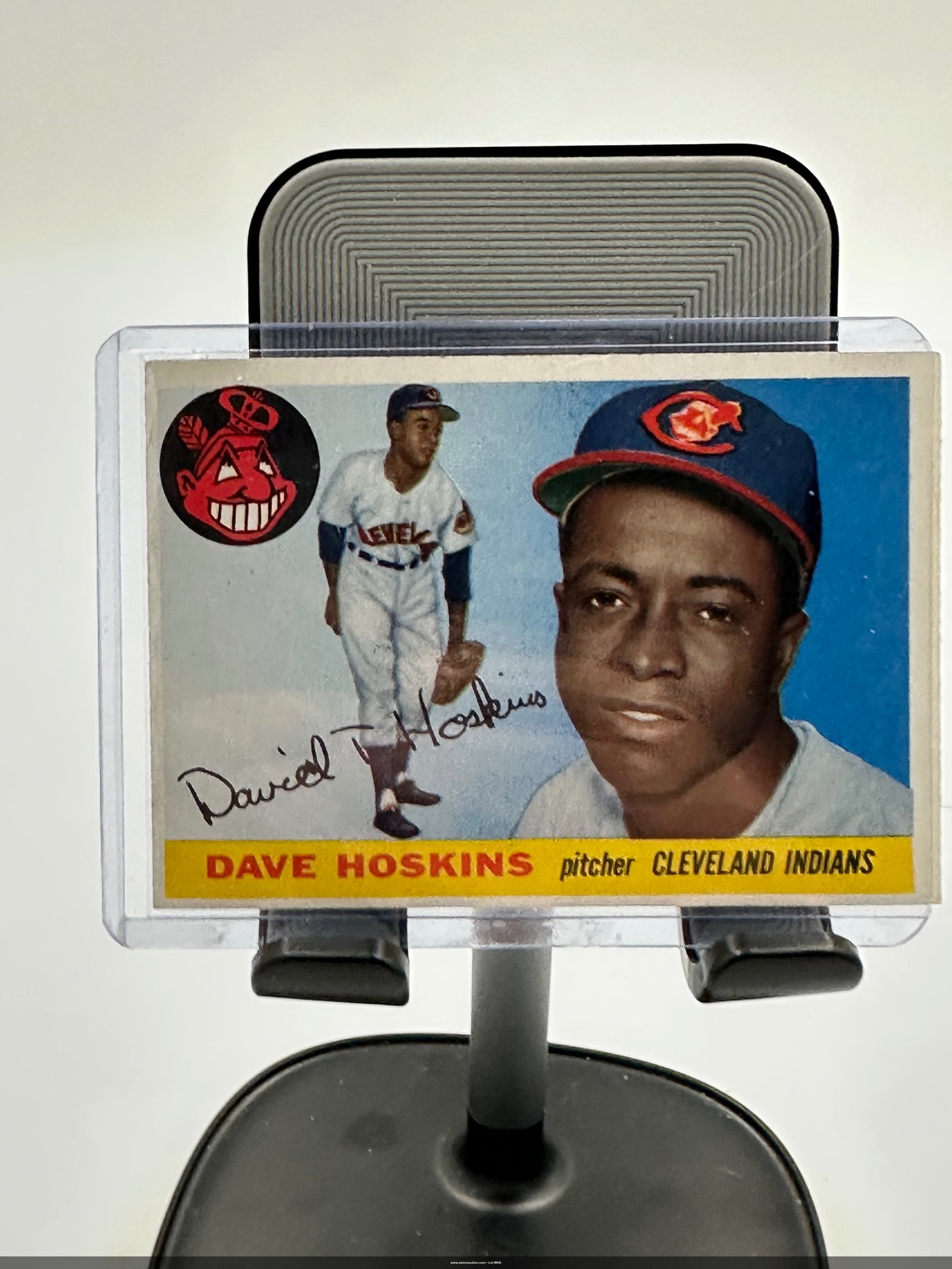 Vintage 1955 Dave Hoskins Baseball Card: Dave Hoskins, a pitcher for the Cleveland Indians. The card showcases a colorful design with Hoskins' image in his team uniform, along with the team's logo. The card is notable for its vintage appeal 